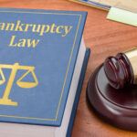 A law book with a gavel - Bankruptcy law